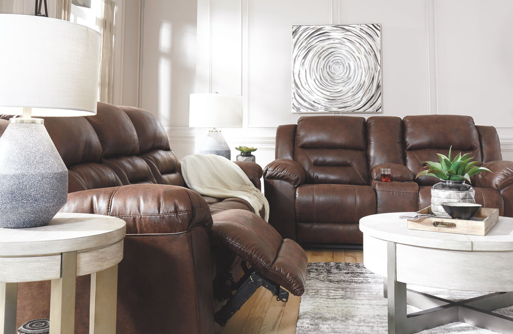 For those that love the cool look of leather but long for the warm feel of fabric, this reclining set delivers both with ease. Its high-performance padded faux leather is remarkably durable and easy to clean, just the thing for family spaces. Channel-stit