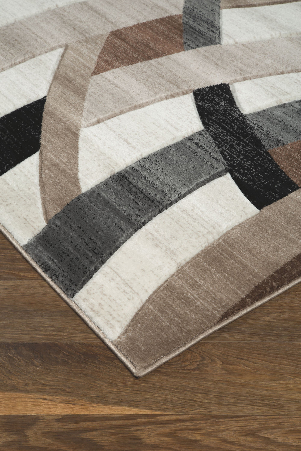 Love an ultra-modern aesthetic? Dress up your room with this area rug. Its plush pileâ€™s carved geometric design in subtle multicolored tones is pure pleasure for the eyes.<br/><br/><b>Product Features</b><ul><li>Made of polypropylene</li><li>Machine wov