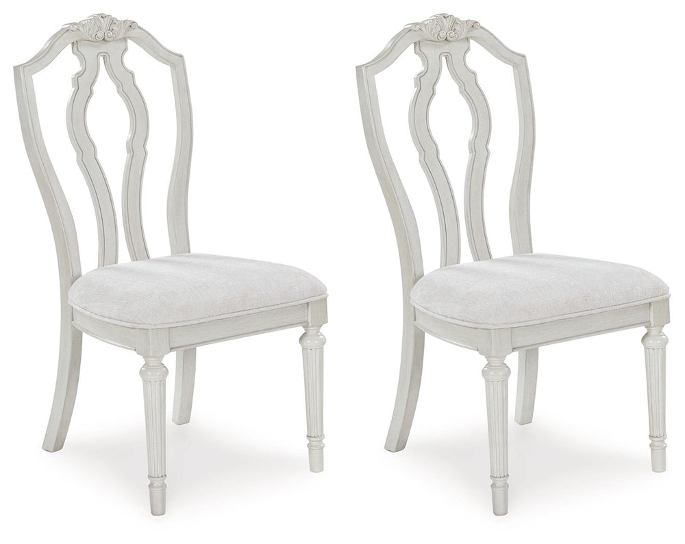 Transform your home into a haven of timeless elegance with this dining chair. Its traditional silhouette, adorned in a classic antiqued white finish, is paired with plush cushioning covered in light pearl gray upholstery. Whether you-'re settling in at me