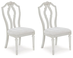 Transform your home into a haven of timeless elegance with this dining chair. Its traditional silhouette, adorned in a classic antiqued white finish, is paired with plush cushioning covered in light pearl gray upholstery. Whether you-'re settling in at me