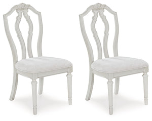 Transform your home into a haven of timeless elegance with this dining chair. Its traditional silhouette, adorned in a classic antiqued white finish, is paired with plush cushioning covered in light pearl gray upholstery. Whether you-'re settling in at me