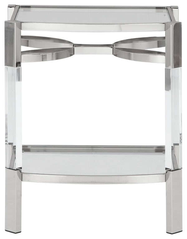If you love the idea of total transparency, this accent table is surely a sight for sore eyes. Crafted of clear acrylic, the glass top and open glass shelf is beautifully on trend. Sleek chrome plated metal legs with clear acrylic accents add a touch of e