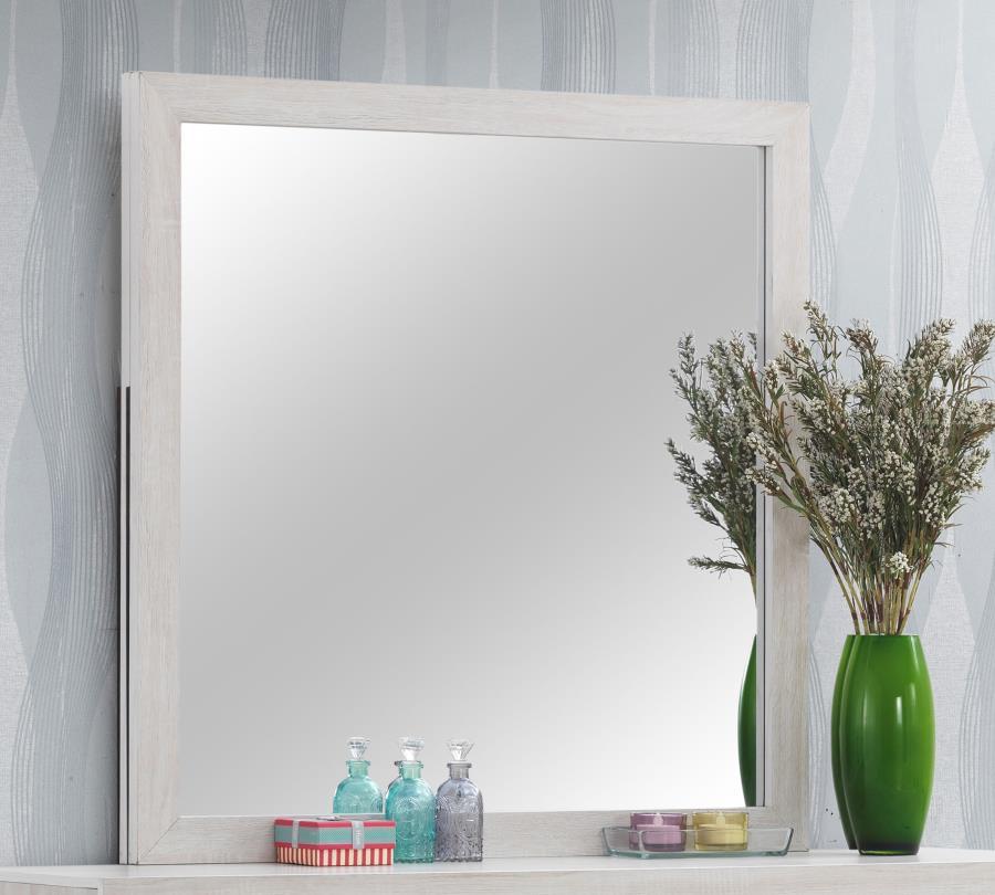 This dresser mirror offers a stylish and functional addition to any bedroom. Designed to pair with the matching dresser, its clean-lined rectangular frame enhances contemporary and modern spaces. Crafted from engineered wood with a durable laminate veneer