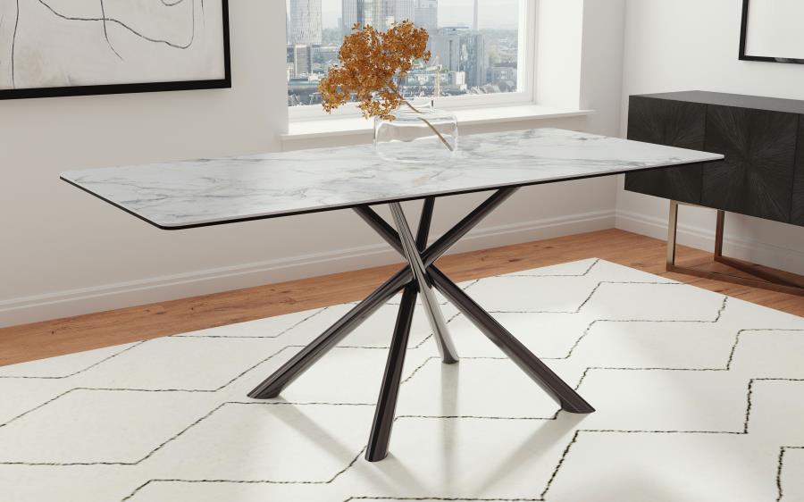 Gorgeous sintered stone brings depth and dimensionality to a modern rectangular dining table. A true centerpiece in your kitchen or dining room, it boasts an enchanting white mirage finish on its table top, offering multi-tonal allure with a hint of glam.