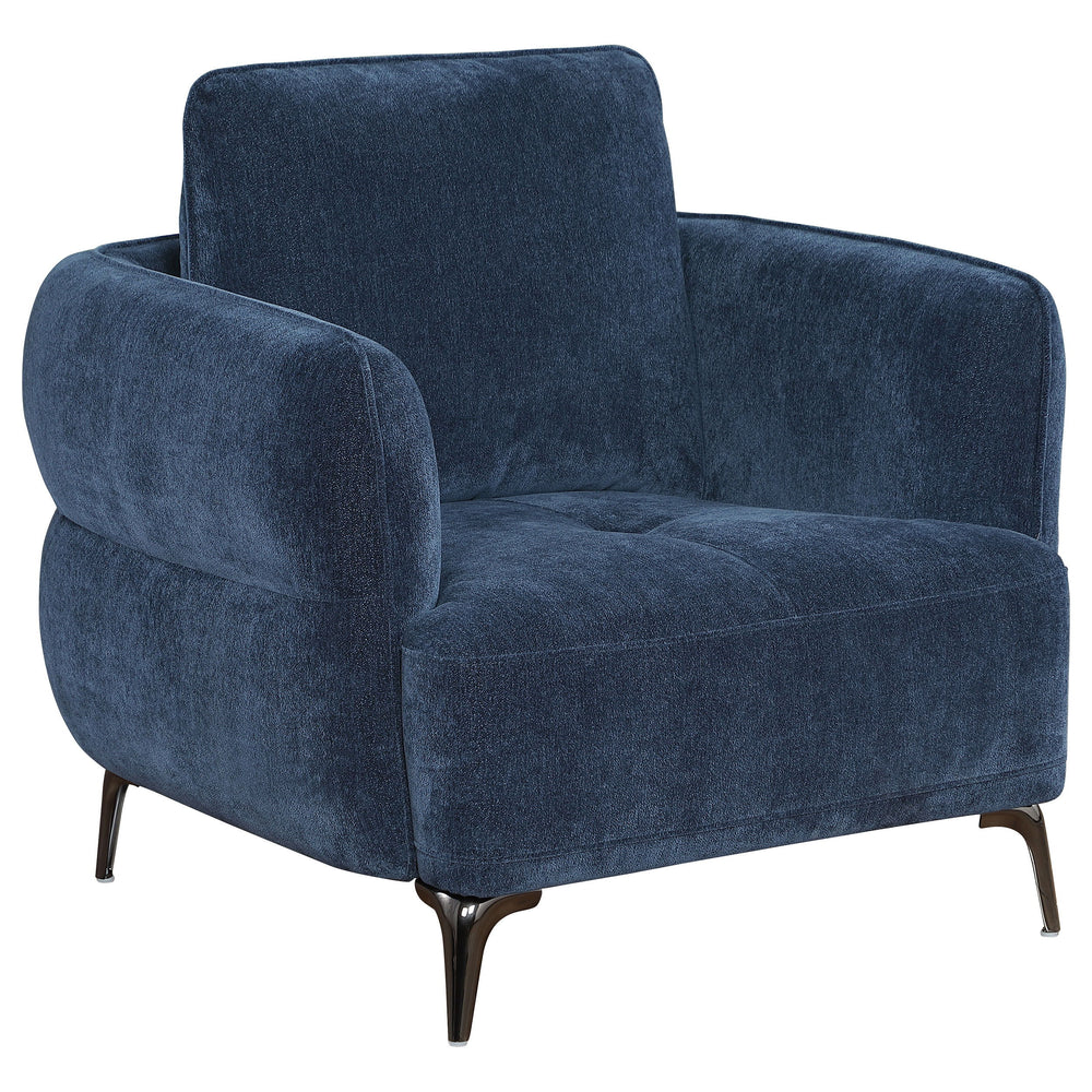 Add a touch of modern elegance to your living space with this stunning chair, designed to capture attention from every angle. Featuring curves in all the right places and an alluring back profile, this chair offers both style and comfort. The deep blue up