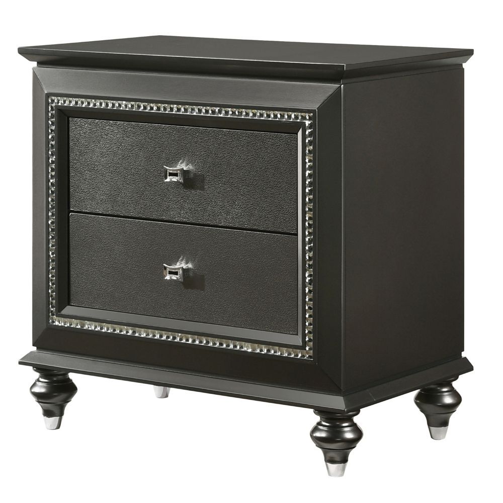 The Kaitlyn nightstand provides a commanding presence in any room. Crafted with a transitional look that is an ideal addition to any bedroom, the nightstand is accented with textured front and a crystal-like sparkling trim. Its crystal-like trimming creat
