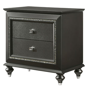 The Kaitlyn nightstand provides a commanding presence in any room. Crafted with a transitional look that is an ideal addition to any bedroom, the nightstand is accented with textured front and a crystal-like sparkling trim. Its crystal-like trimming creat