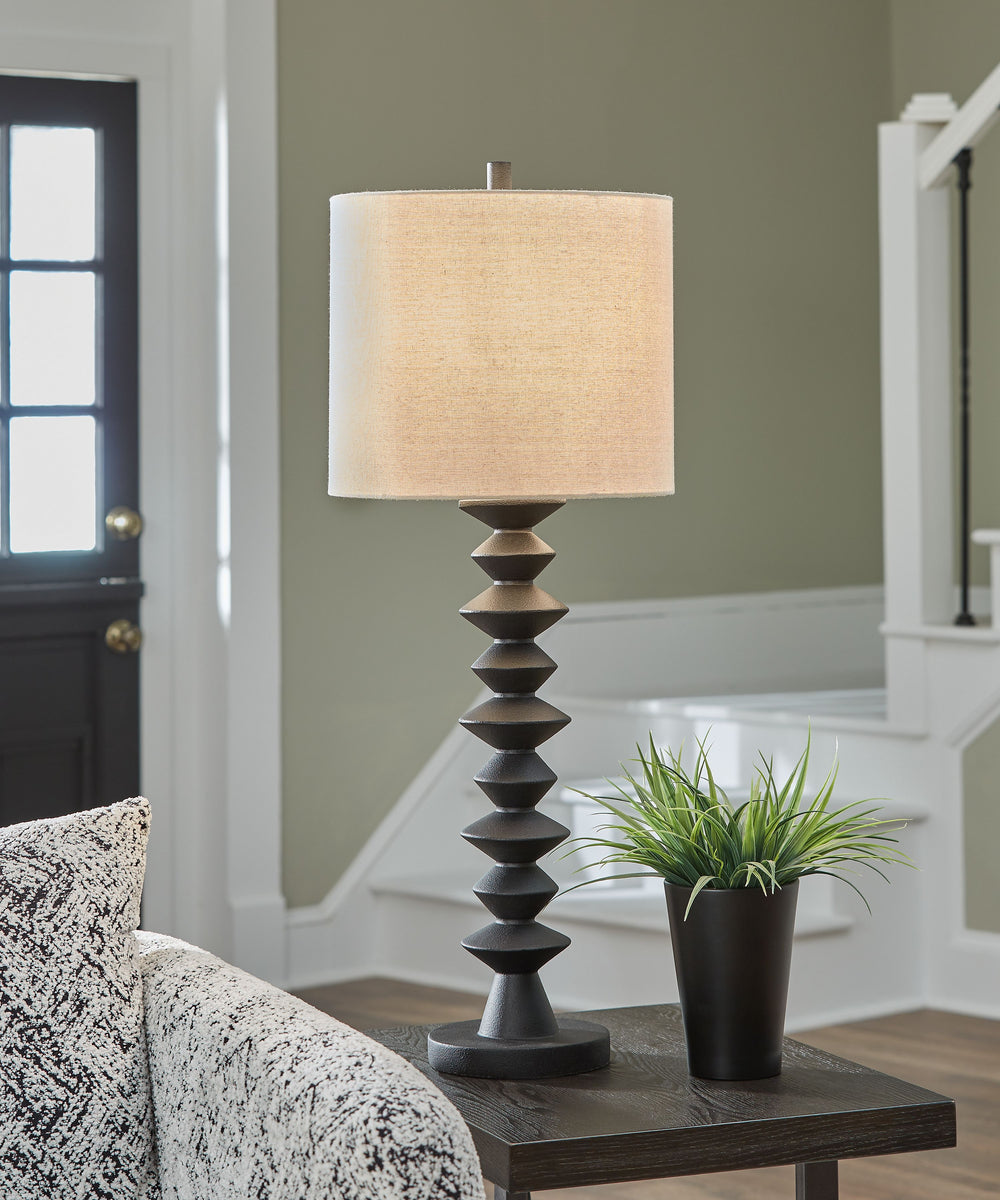 Shed new light on your existing decor. This buffet lamp-'s geometrically-inspired base is adorned in striking black for that pop of contemporary flair you love. Perfect for a console table or mantel, it beautifully brightens living areas, bedrooms or entr