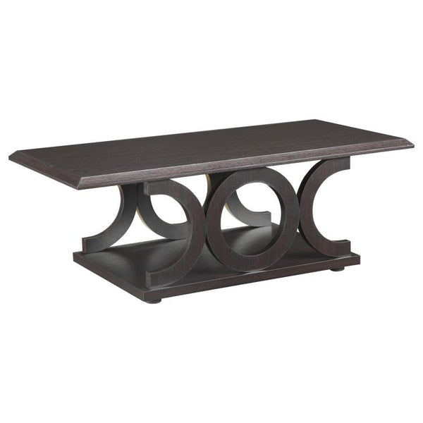 Elevate your living room with this modern coffee table, featuring a striking design with circular accents on the base. The cappuccino finish adds rich warmth, while the durable engineered wood construction ensures lasting quality. Its smooth, scratch-resi