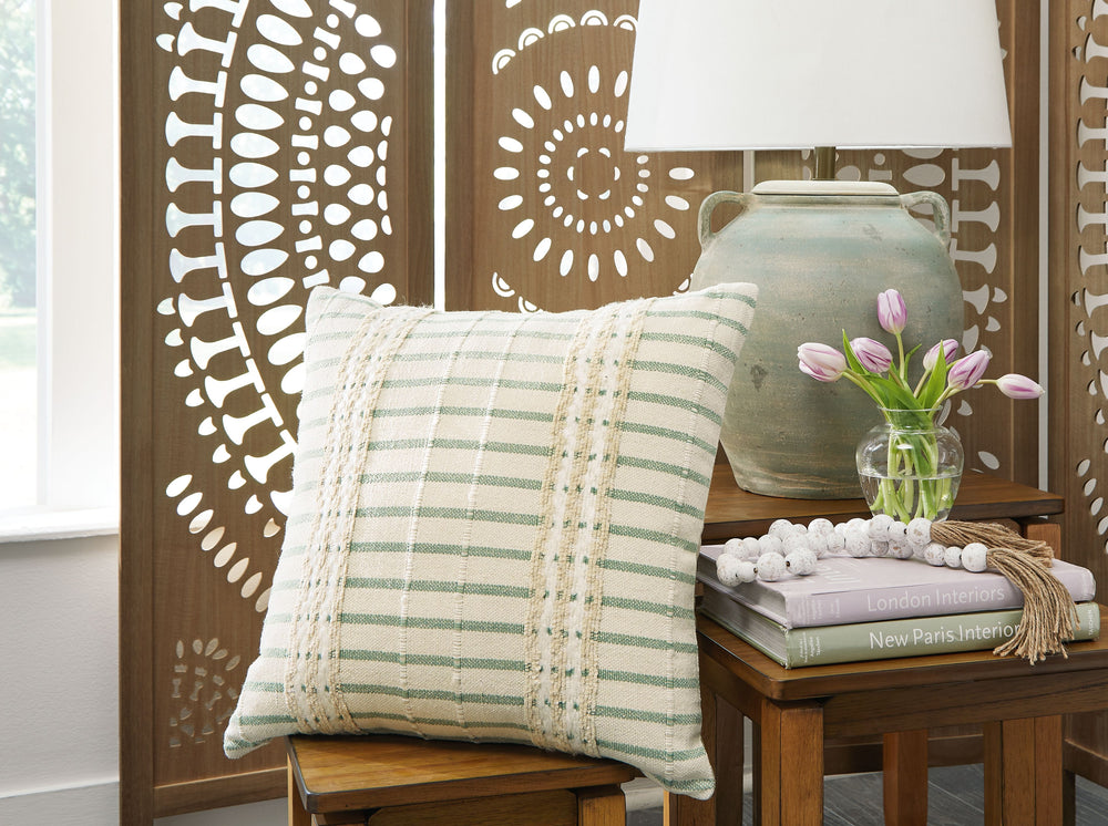 Dress up your sofa or bed with the casual charm of this accent pillow. It-'s a timeless addition to your decor, with a simple striped pattern that-'s both classic and modern. The pillow-'s white, green and natural hues make it beautiful living on its own 