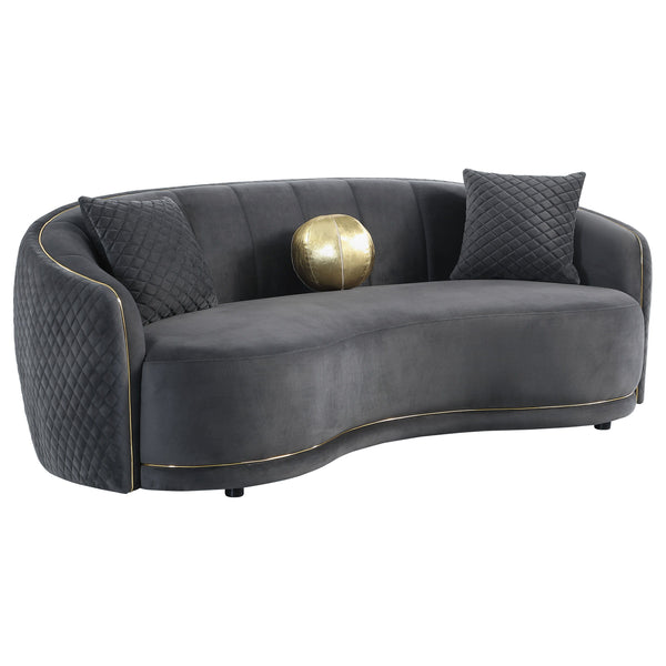 Encourage sophisticated aesthetics with the refined silhouette and gorgeous gold trim featured on a modern sofa. Upholstered in dark gray, it boasts a gently curved kidney silhouette that creates a rich, inviting ambiance in your living room. Its sloping 