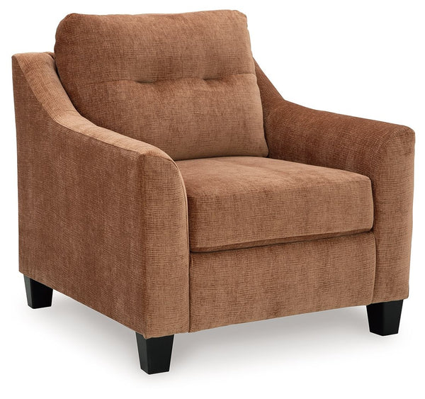 Urban contemporary meets mid century (with a pop of trend-right color) in this chair. Supremely soft upholstery, teeming with luster and movement, finesses the piece with just the right touch. Gently flared arms and tufted back cushions let you bask in th