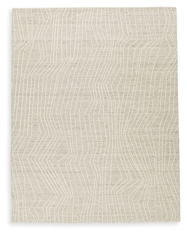 Sporting a linear abstract design, this high-style rug brings a comfortably cool vibe to contemporary spaces. Itâ€™s simplistic yet compelling in shades of gray and ivory. Simply add the rug to a living room or bedroom to instantly bring new life to your 