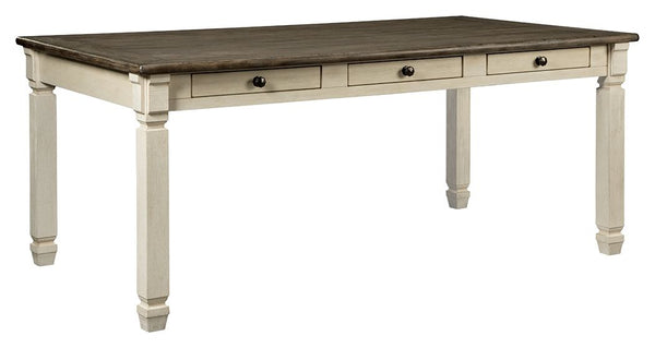 The beauty of this dining table is something to savor. A two-tone textural finish gives this rectangular dining table with plank-effect top a double helping of charm. Six drawers built into the table apron allow you to keep placemats, napkins and utensils