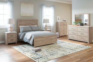Cool, clean and casually modern. This panel bedroomâ€™s light natural finish sets the tone for your calming sanctuary. Framed elements and cross-brace accents add dimension and authenticity to the bedâ€™s simply stunning profile. <h4><b>Senniberg - Light 