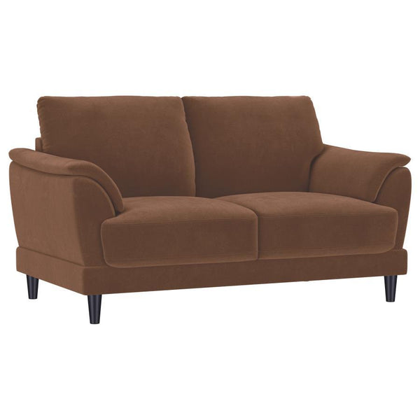 Add a touch of retro charm to your living space with this stylish loveseat. Upholstered in rust woven fabric, it combines plush foam seat cushions and curved tufted arms for a cozy and supportive feel. Built with a fully encased engineered wood frame and 