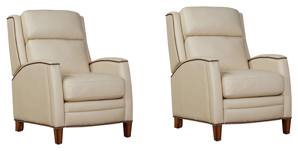 The Vermont power recliner offers a luxurious and effortless power pushback recline feature, allowing you to easily find the most comfortable position for relaxation. It is upholstered in soft leather with custom matching and features decorative nail head