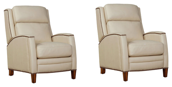 The Vermont power recliner offers a luxurious and effortless power pushback recline feature, allowing you to easily find the most comfortable position for relaxation. It is upholstered in soft leather with custom matching and features decorative nail head