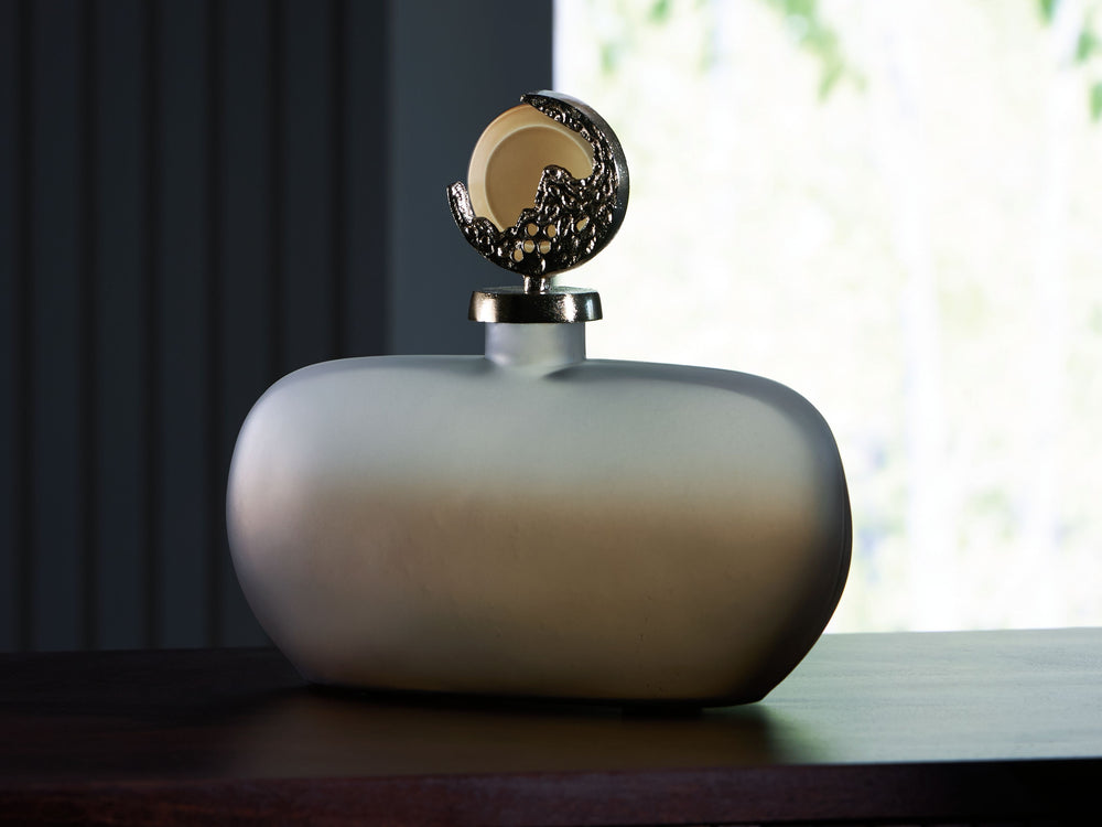 Bring stately elegance home with this jar. Made with frosted glass in a luxurious taupe finish, its ombre effect adds visual intrigue to a shelf or mantle. A textured goldtone topper provides an added dose of traditional flair.<br/><br/><b>Product Feature