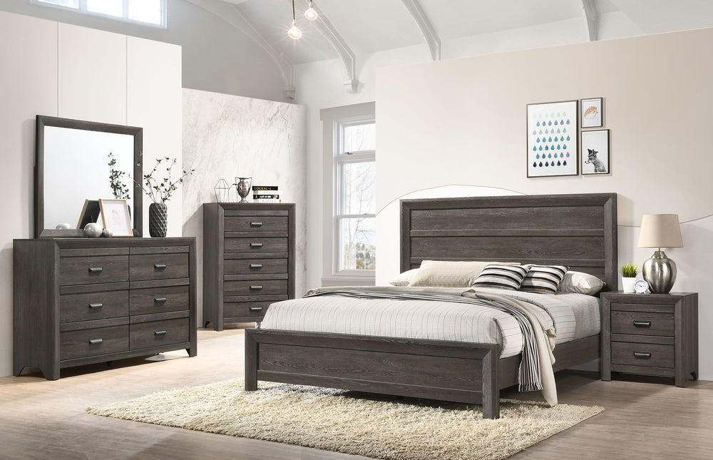 This bedroom set is the embodiment of understated sophistication, featuring a muted gray finish that complements its clean and contemporary design. The robust bed frame anchors the room with a sense of sturdiness and style. Accompanying the bed are coordi