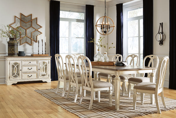 Traditional cottage design. Antiqued two-tone finish featuring chipped white with distressed wood finished tops. Tops feature Oak veneers, while the cases are made with birch veneers and hardwood solids. Framed drawer fronts and decorative fret laid over 