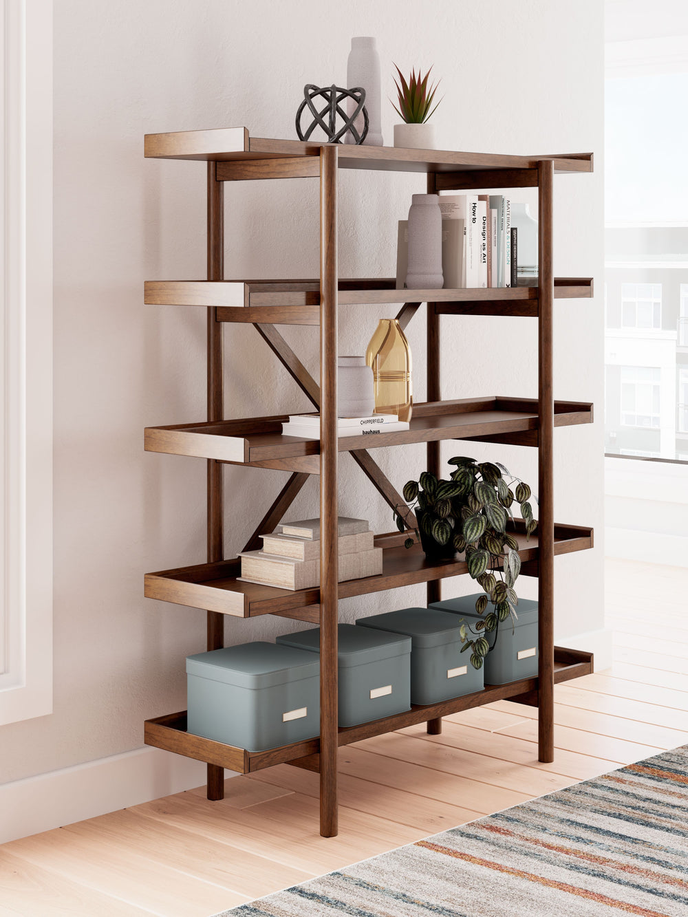A refreshed take on retro aesthetics. This bookcase adds an air of playful simplicity to your home, capturing the architectural language of mid-century stylings. Subtle in design, it invites the eye with a sleek, open frame. A casual, yet timeless, finish
