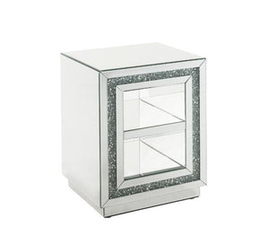 Make a striking statement in your home with this Noralie End Table. Featuring mirror finish with faux diamond inlay, it creates a bold, yet elegant textured look. Shimmering border design with faux diamonds adds modern glamour to this piece. Two tier shel