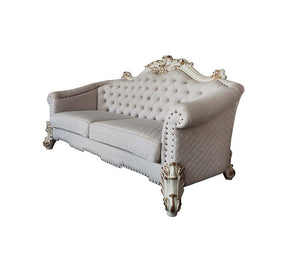 Tracing back to the classical Baroque era, expressed with intent and conviction, our new interpretation of Vendome II is donned. The Vendome II sofa-'s light gray fabric is grand and classy with crystal like button tufting on the back in a crackled gold p