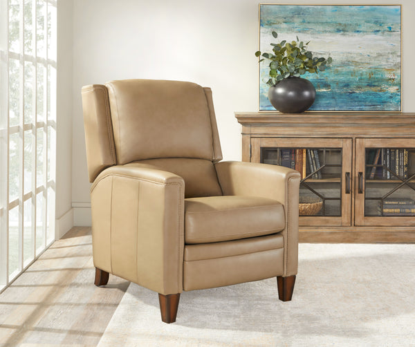 The Connor recliner boasts an effortless power recline for seamless relaxation. Upholstered in the finest soft leather with a custom match, it exudes sophistication. The decorative twisted rope stitching detail adds a touch of elegance, while the high leg