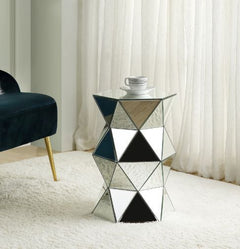Balance your room decor with this glitzy modern work. Unique design brings modern glamour to your room areas. This beautiful mirrored pedestal features a attractive polygon base, adding depth and dimension to your room design. It-'s multi-layered look can