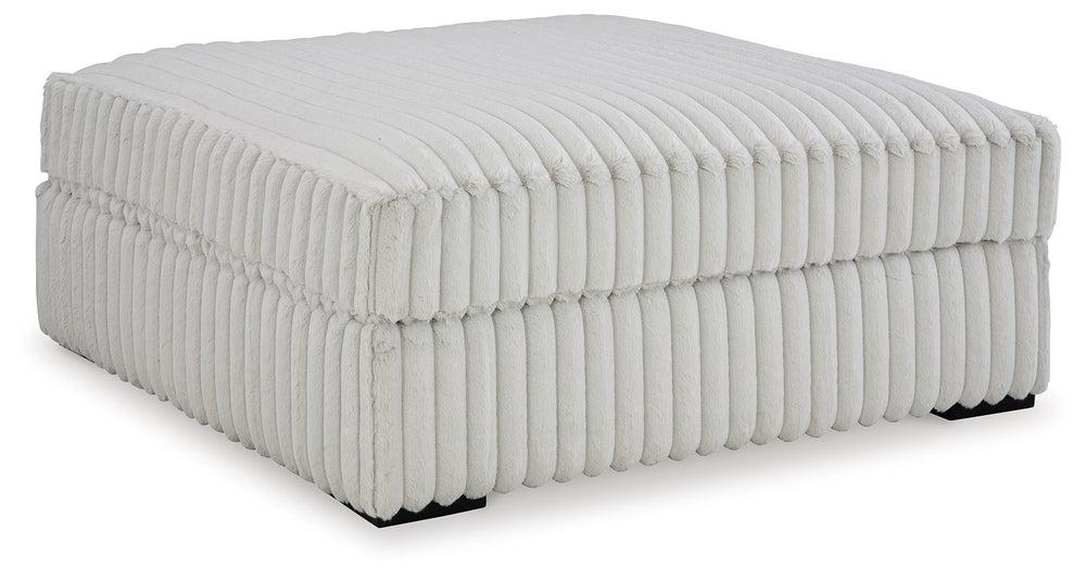 Donâ€™t want to sacrifice standout style for a cozy seating companion? This oversized accent ottoman pairs bold character with kick-back comfort. Its retro-cool jumbo cord over a feather-blend cushion creates a luxuriously soft lounging experience. With t
