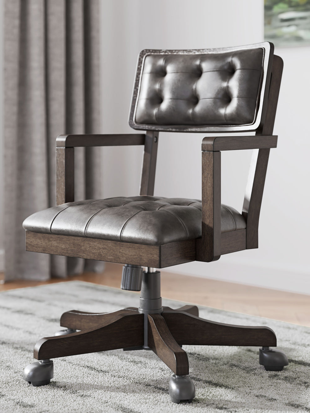 Classic meets contemporary in this home office chair. With a rich dark wood tone and tufted faux leather, it suits todayâ€™s trends while balancing a timeless appeal. Casters provide easy mobility, while the adjustable seat allows you to find your perfect