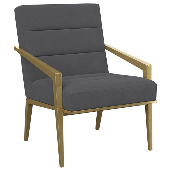 Restrained, modern style meets elegant artistry in a striking contemporary armchair. Designed to stand out, it boasts an upholstered seat and back with a metal frame and arms. The streamlined look receives a gleaming gold finish, adding sophistication any