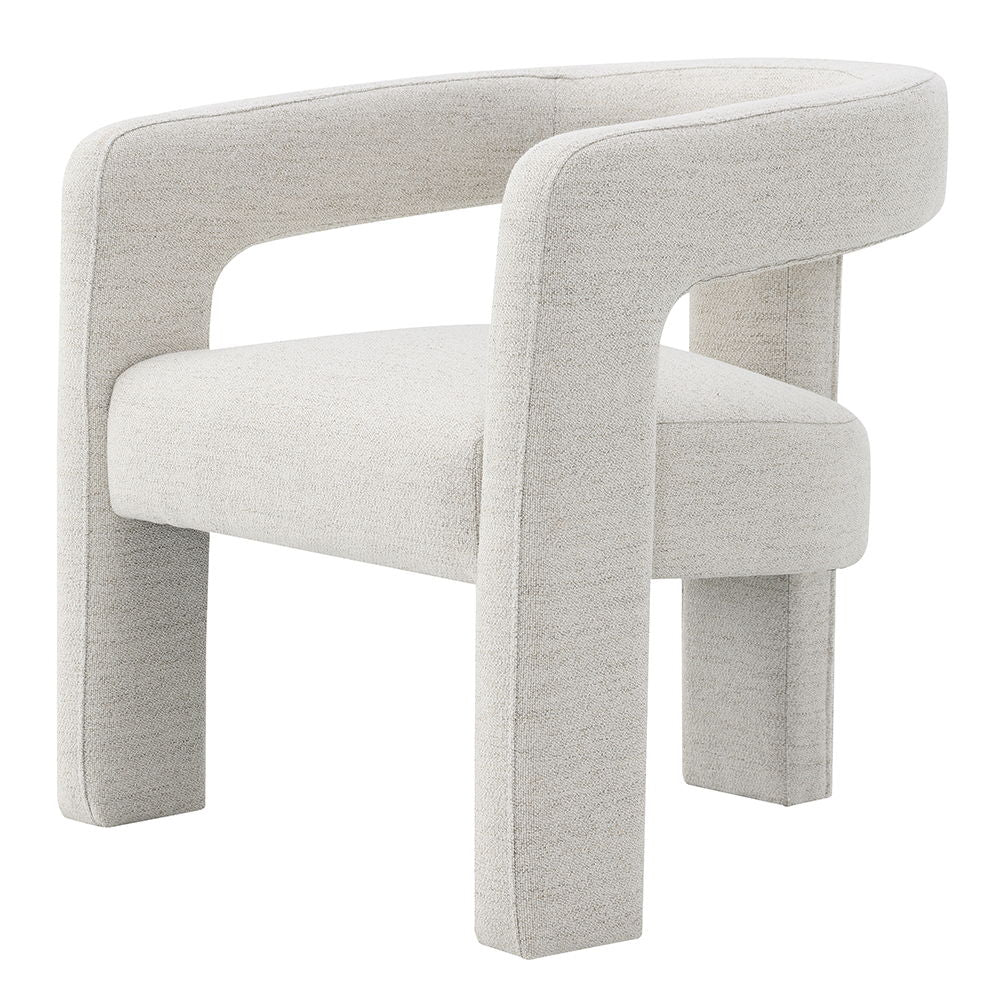 The Lomas collection side chair featuring a soft beige boucle fabric, exudes modern sophistication and comfort. Its unique design and plush texture make it a stylish addition to any living space, creating an inviting atmosphere for relaxation and conversa