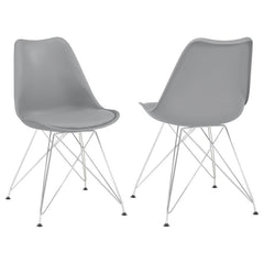 Designed with modern elegance in mind, this grey dining chair beautifully updates a contemporary home with its stylish silhouette and sleek materials. The seat and back are covered in smooth leatherette upholstery, adding a subtle textural appeal that pai