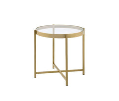 Simple design exhibits a real sense of style. The Charrot End Table has a tempered glass top with round shape design to give you a clean, spacious table top space. The lustrous gold finish showcases it-'s cross metal base and metal trim for a clean-lined,