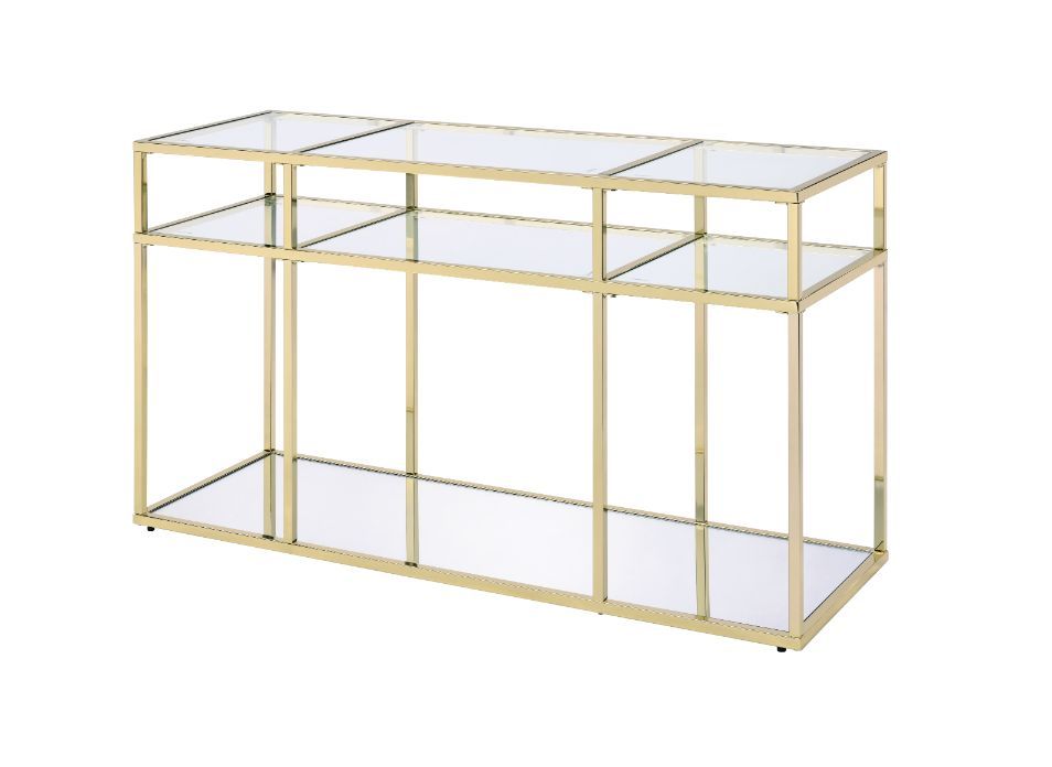 Modern simplicity makes your space feel uncluttered and stylish. The Uchenna Sofa Table has a brilliant color and lustrous finish to enhance it-'s sleek modern silhouette. Metal table frame in a gold finish exudes lustrous shine, topped with tempered glas