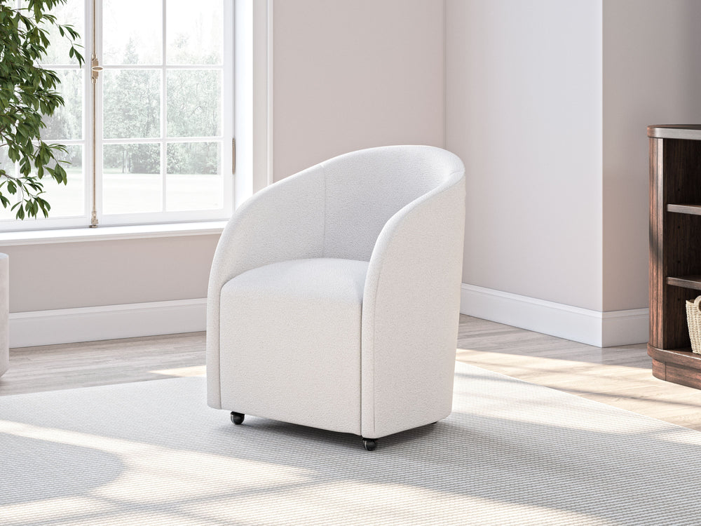 This fully upholstered desk chair makes a lasting impression in a simply stunning way. Its magnificent curves are enhanced with a neutral boucle upholstery thatâ€™s so pleasing to the eye. This bucket chair is the piece youâ€™ve been looking for to elevat