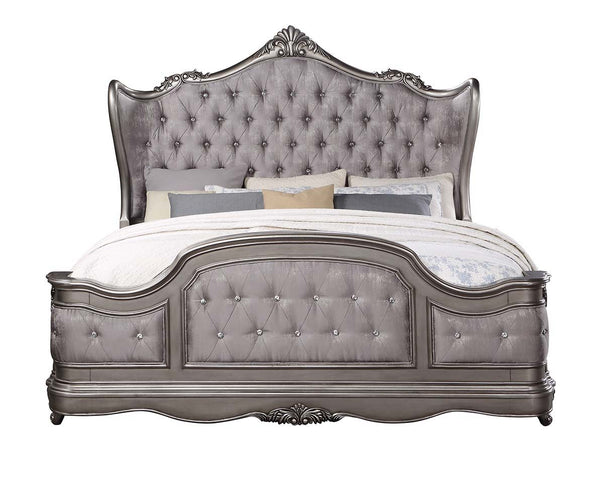  featuring intricate carvings that embody the period. The wingback headboard is a classic design is accented with crystal-l