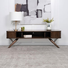 As the centerpiece of any sophisticated living room, this 71" TV stand, with its mid-century modern design, brings a touch of elegance and timeless charm. Its sleek silhouette is perfectly complemented by the rich walnut finish, offering a warm, inviting 