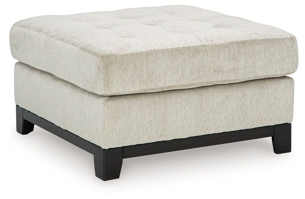 Fresh, on-trend style meets functionality in this oversized accent ottoman. Details like a tufted top cushion and wrap-around accent base reflect your urban contemporary tastes while staying versatile as your style changes. And with its soft upholstery, y