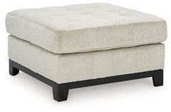 Fresh, on-trend style meets functionality in this oversized accent ottoman. Details like a tufted top cushion and wrap-around accent base reflect your urban contemporary tastes while staying versatile as your style changes. And with its soft upholstery, y