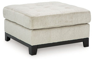 Fresh, on-trend style meets functionality in this oversized accent ottoman. Details like a tufted top cushion and wrap-around accent base reflect your urban contemporary tastes while staying versatile as your style changes. And with its soft upholstery, y