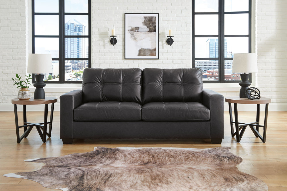 Everyday comfort meets versatile style in this sofa with matching loveseat and recliner. The handsome hue of the goes-with-anything faux leather takes away the stress of styling, expertly pairing with your existing aesthetic. From kicking back on the week