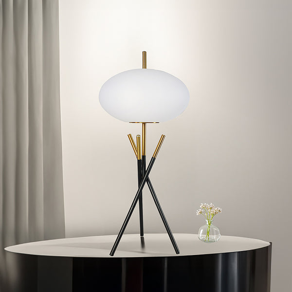 tripod-style base in a striking black and gold finish