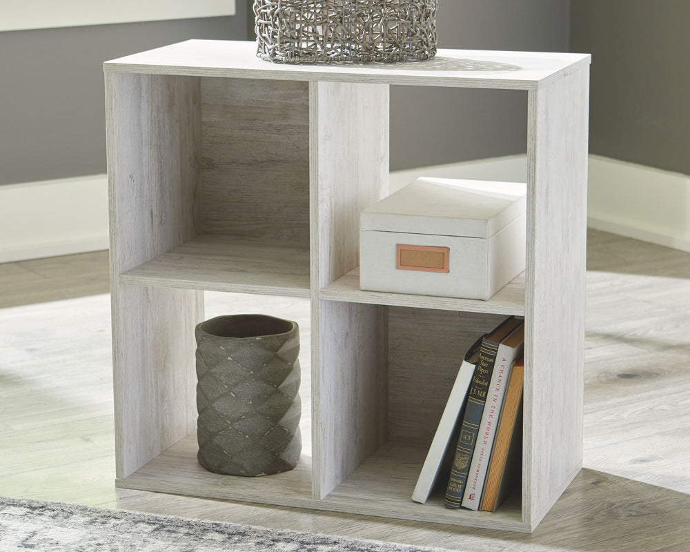 If itâ€™s coastal chic or cottage quaint style you long for, the Paxberry whitewashed four-cube organizer invites you to go to town. Its distinctive weatherworn finish conveys an easy-breezy sensibility, perfect for a restful bedroom retreat. Open and clo