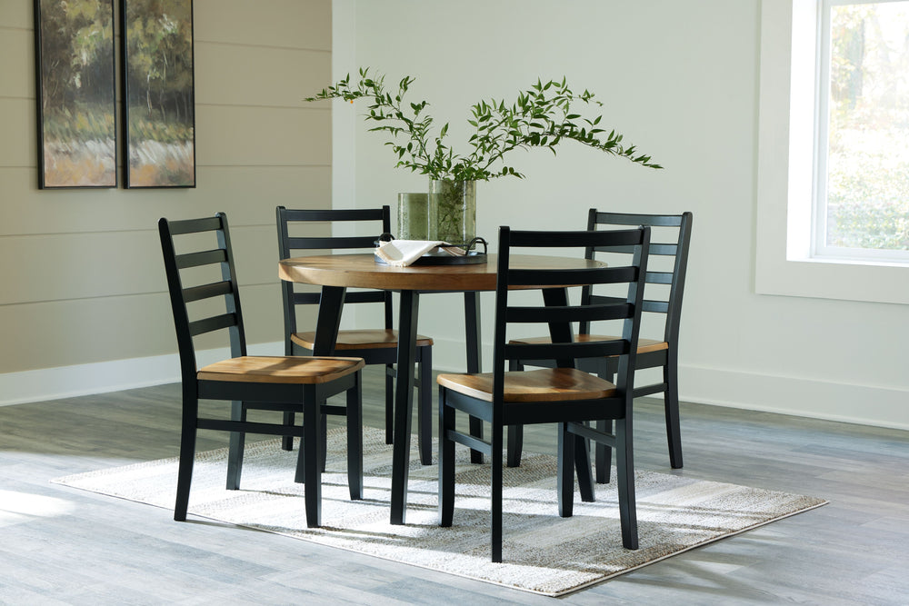 Transform your dining area into a delightful rustic retreat with this five-piece table set. A two-tone finish adds a layer of charm, creating a visually appealing look that catches the eye. The tabletop-'s inlay chevron pattern adds a unique and stylish t