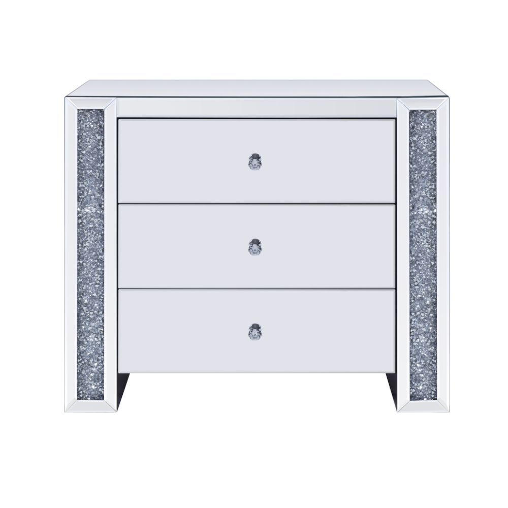 The Noralie Console Table will give any room a touch of glamour. This contemporary console table is fully mirrored with a stunning mirror top and a faux gem inlay on each leg of its sled base. Use this unique piece as the perfect accent for any room Decor