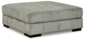 Plush and posh. Showcase your eye for on-trend texture with the statement-making cord upholstery of this oversized accent ottoman. Its stunningly soft fabric entices in a warm neutral hue, complementing contemporary color palettes. Let your feet sink into