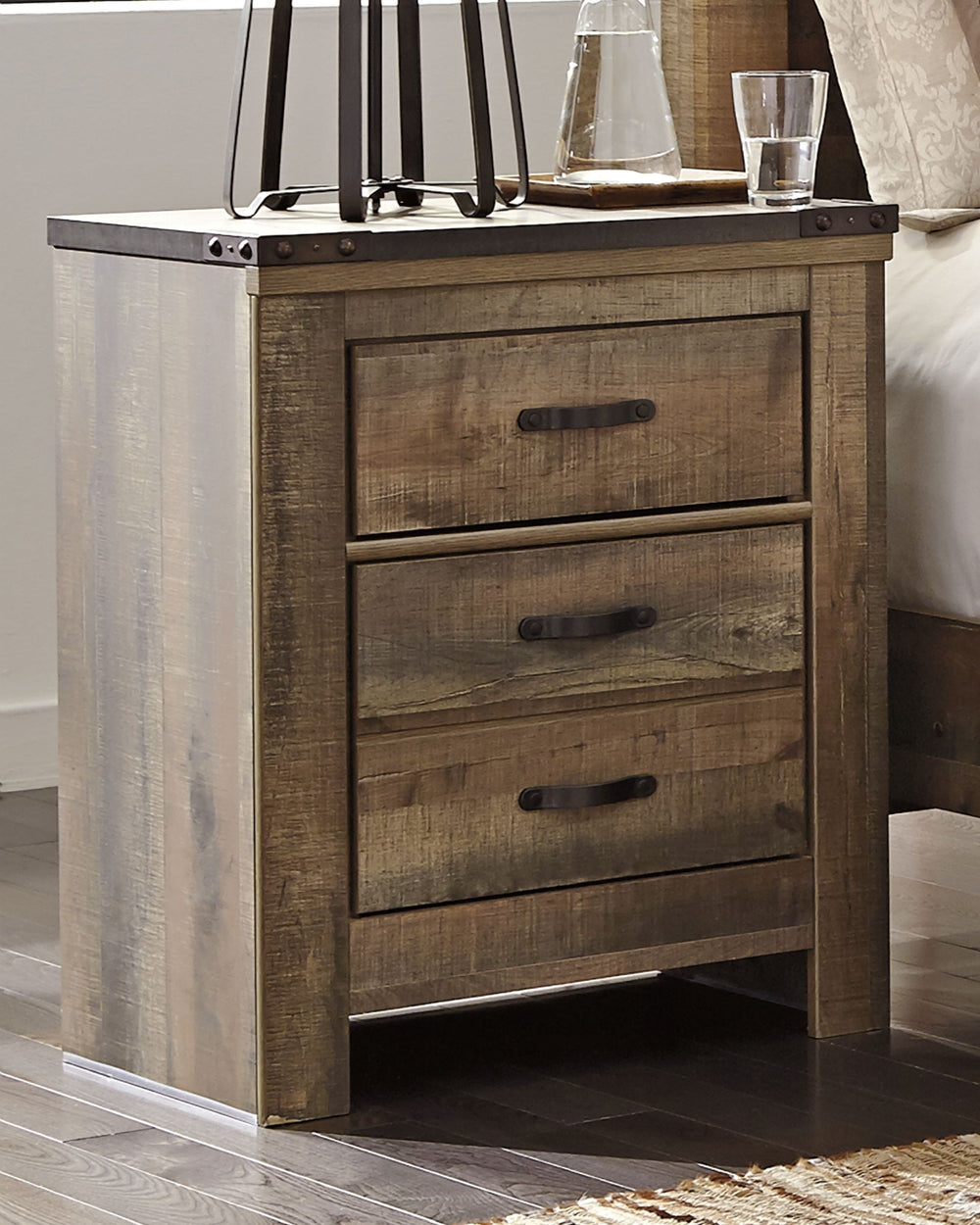 Whether she loves horses or he-'s a cowboy at heart, this nightstand matches their authenticity. Its rustic finish, plank-style details and nailhead trim pay homage to reclaimed barn wood, making for a chic look loaded with charm. An included charging sta